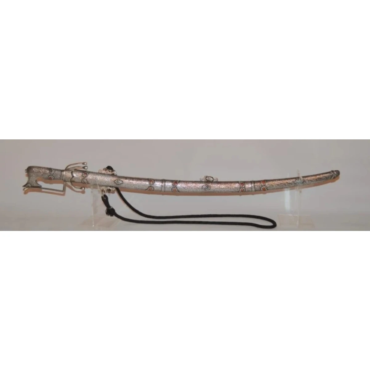 Handsome sword with partly silver mounted handle