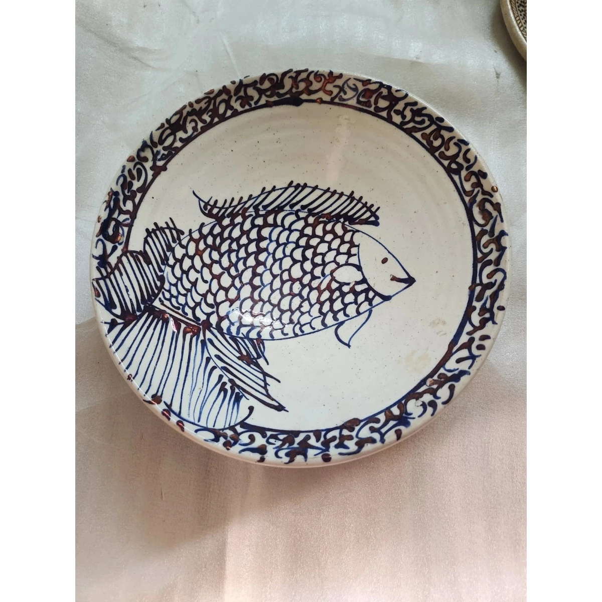 White and dark blue and ceramic plate