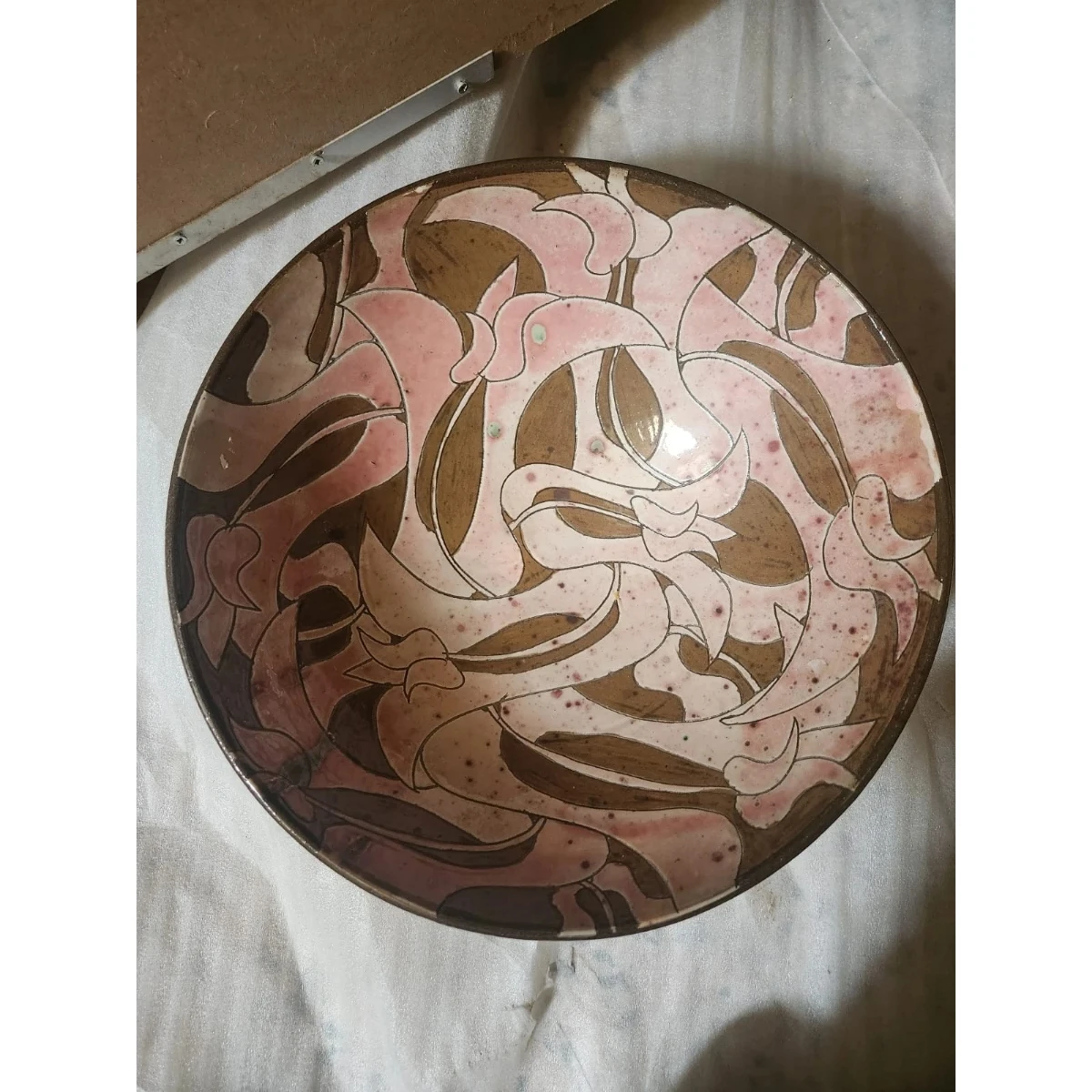 Pink and brown ceramic plate