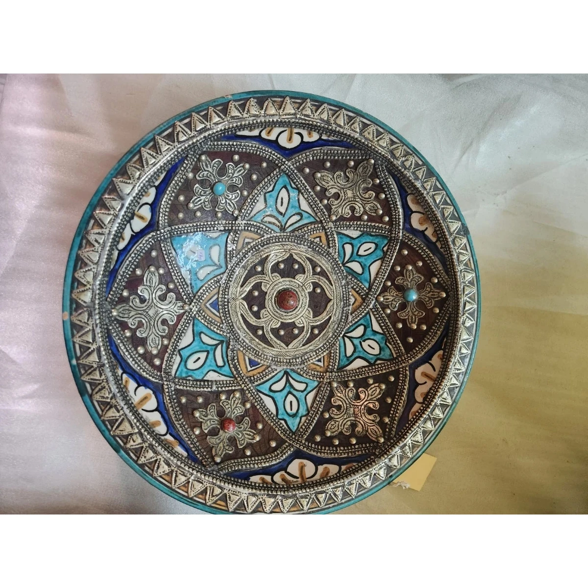 Large metal mounted polychrome ceramic plate