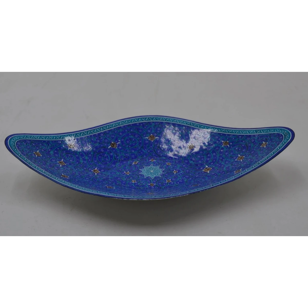 Boat shaped footed bowl