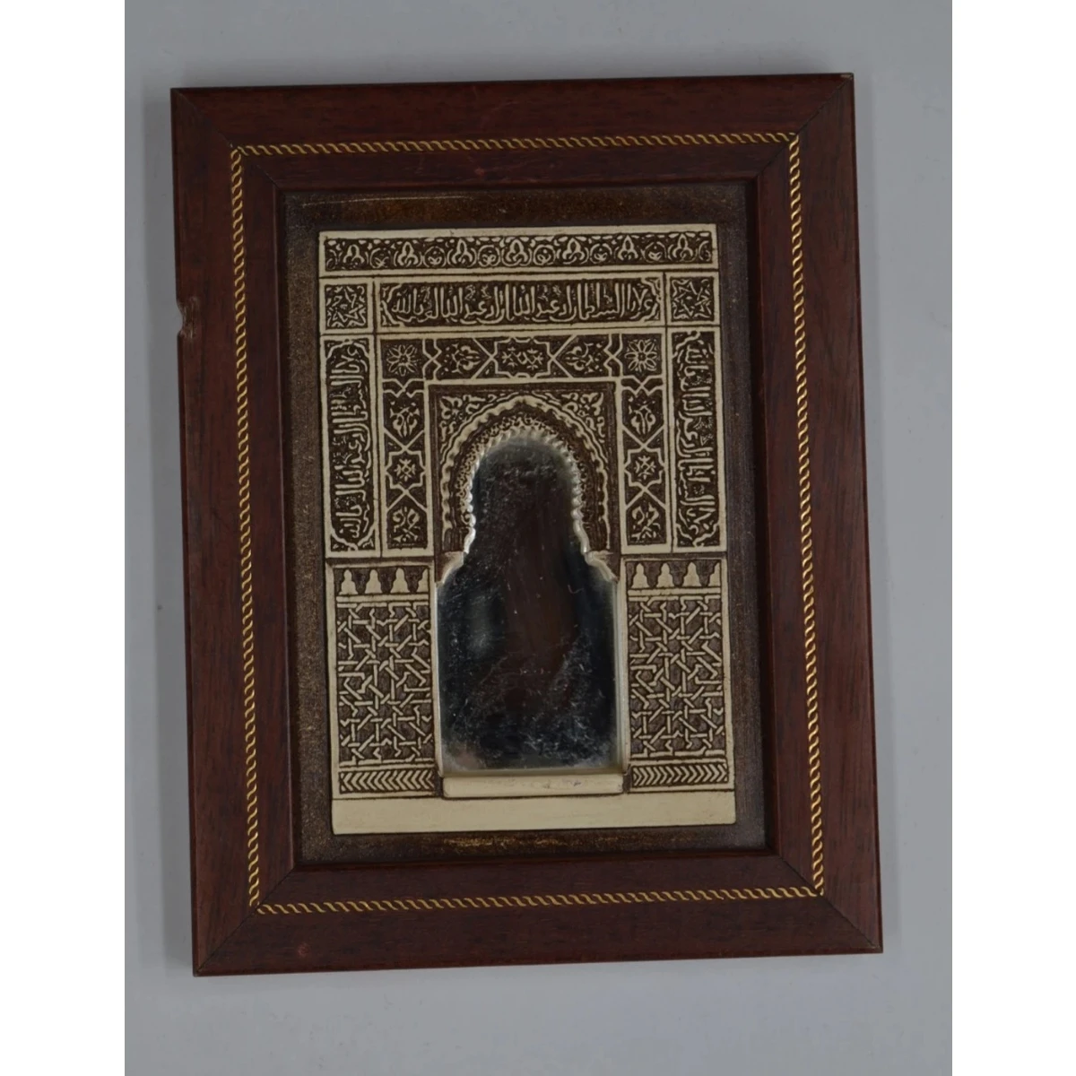 Wooden frame with a band of gold knot