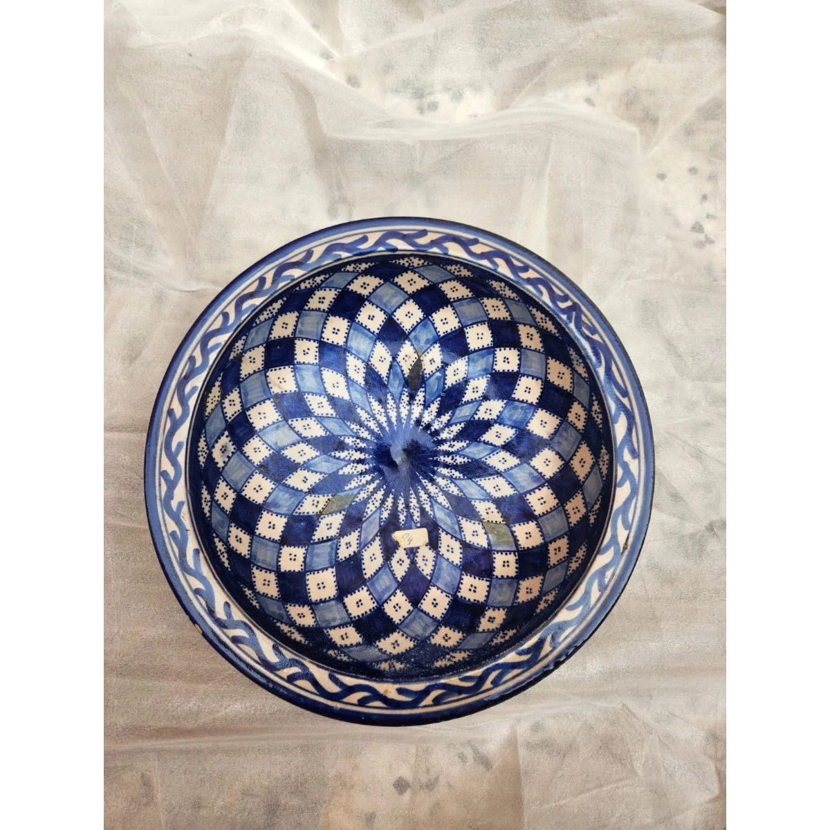 large and deep plate,decorated with dark blue